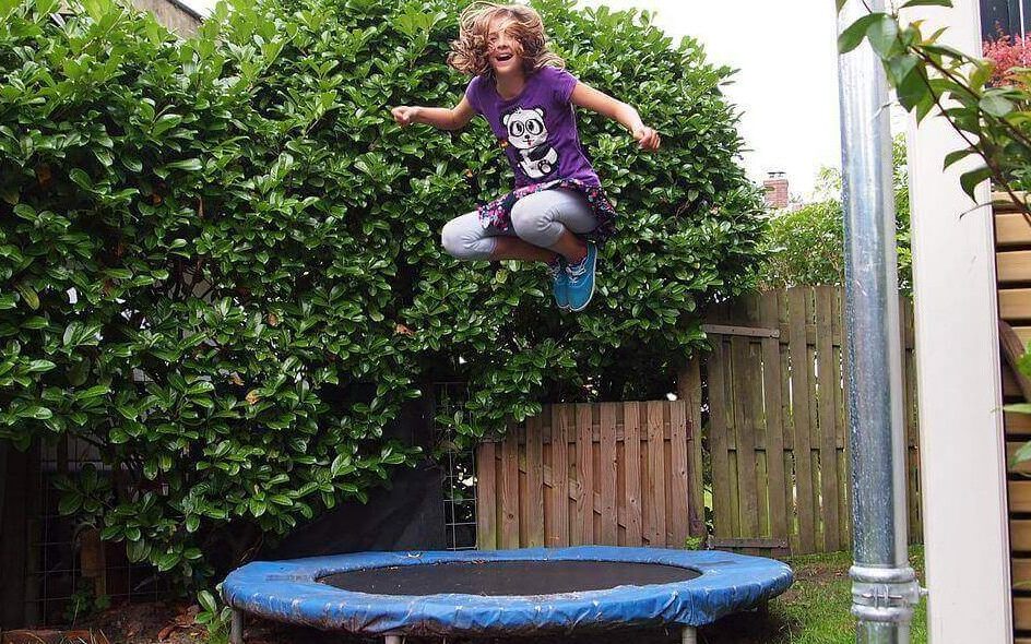 jumping on trampoline